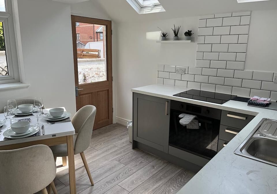 Kitchen with M&S Plates ,cups etc 