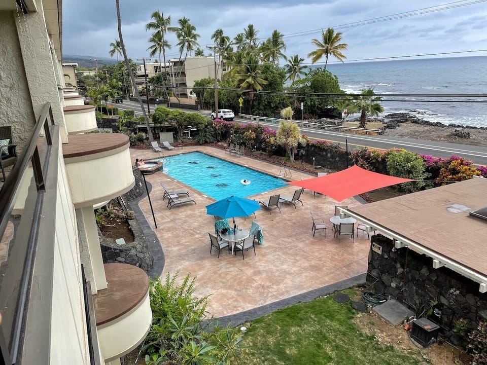 Wonderful Pool & Deck Area and with just 14 condos at your Boutique Resort. Relax and soak up the sun at the community pool with loungers and seating areas overlooking the tropical surroundings.