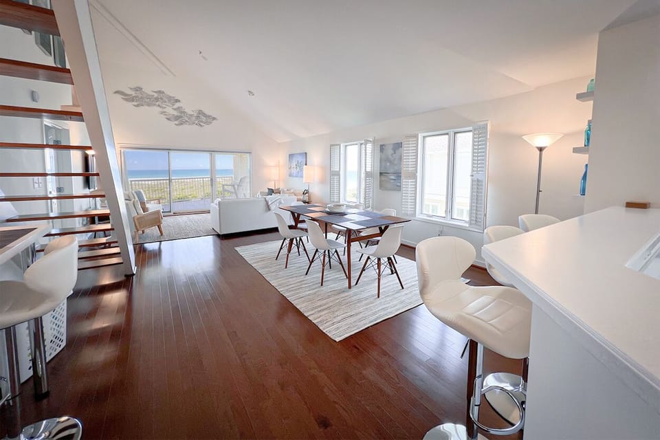 Dining area with seating at kitchen bar