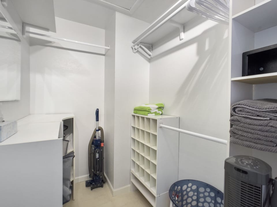 Keep your clothes clean and wrinkle-free in the spacious master closet
