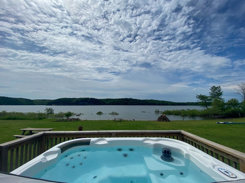 Soak your cares away under the blue skies of Beaver Lake.