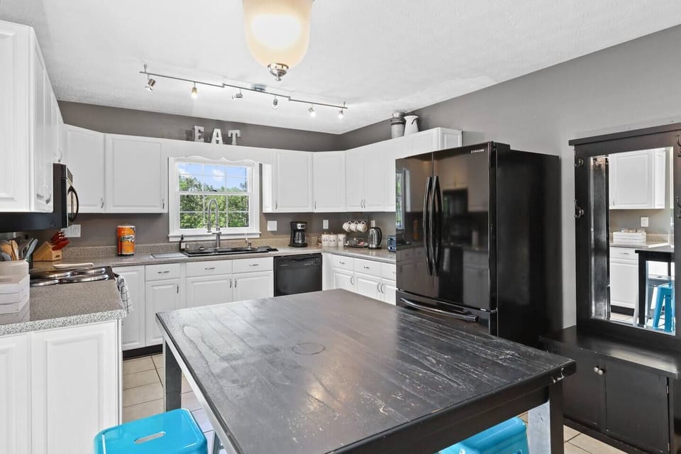 View as you enter the front door into the kitchen and dining area. 