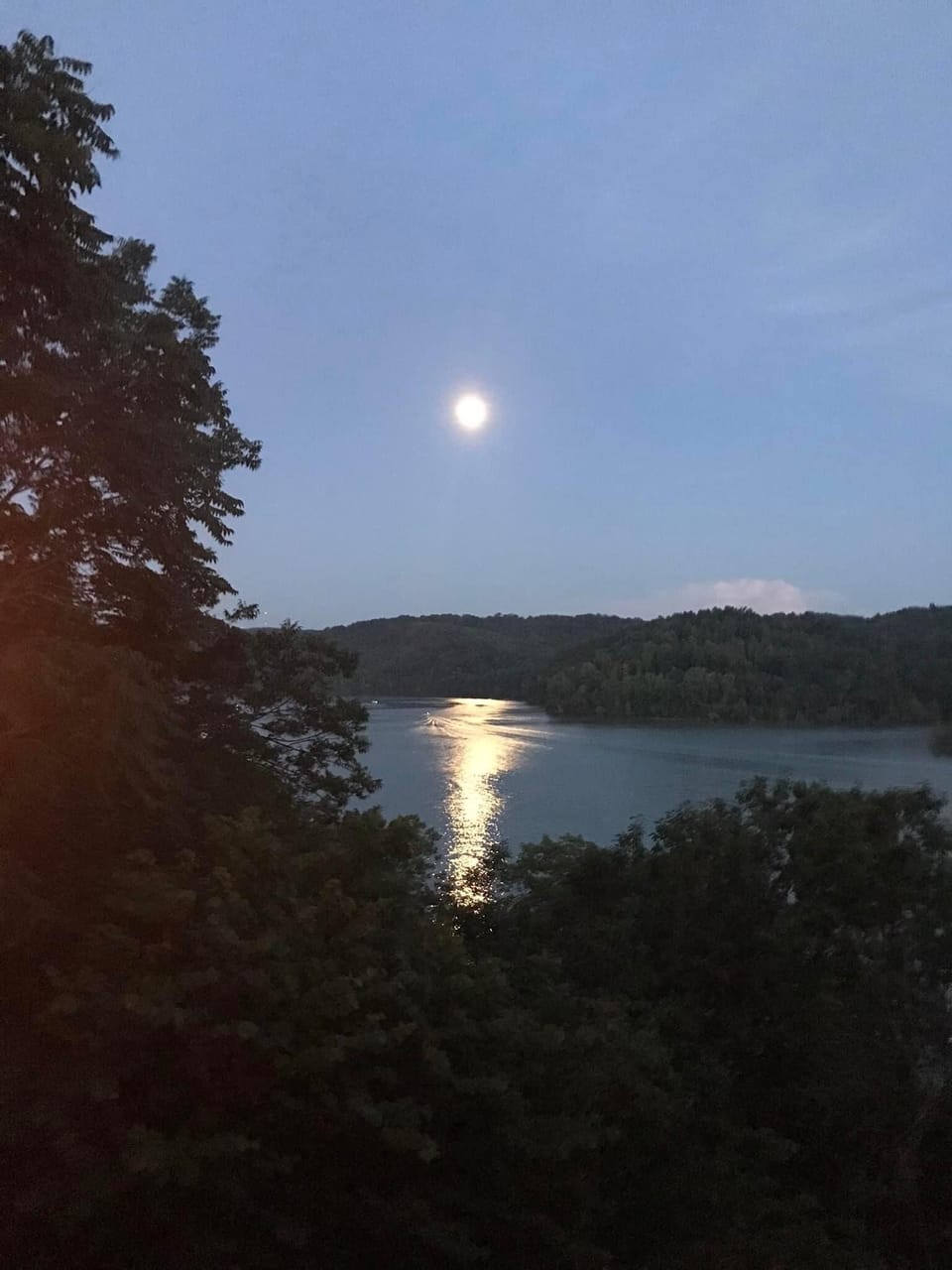 Moon lighting up the lake