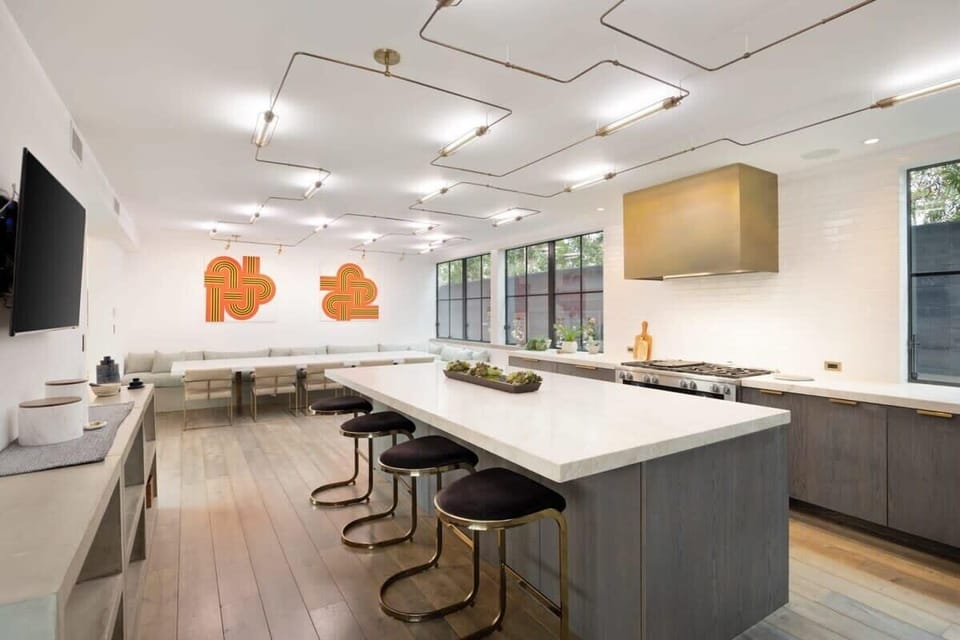 Take a seat on one of the stylish bar stools in the open kitchen.