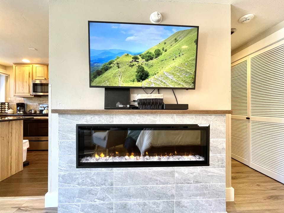 Enjoy the ambiance of the fireplace.