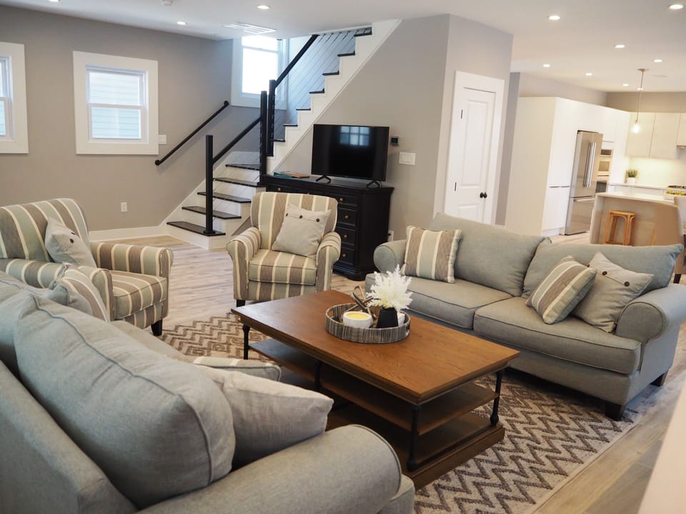 Living room with fireplace to relax after a day at the beach