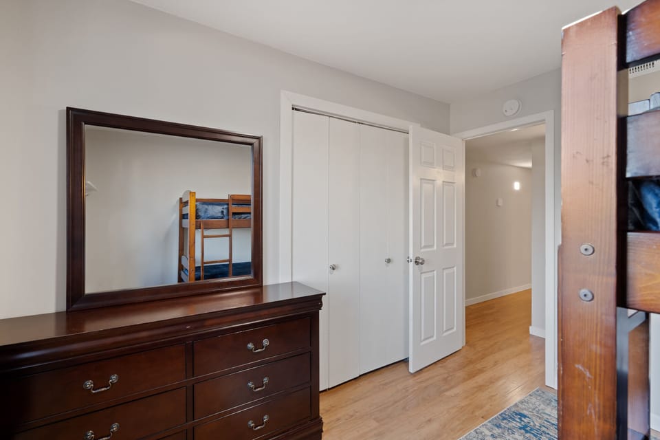Dresser and closet in each room