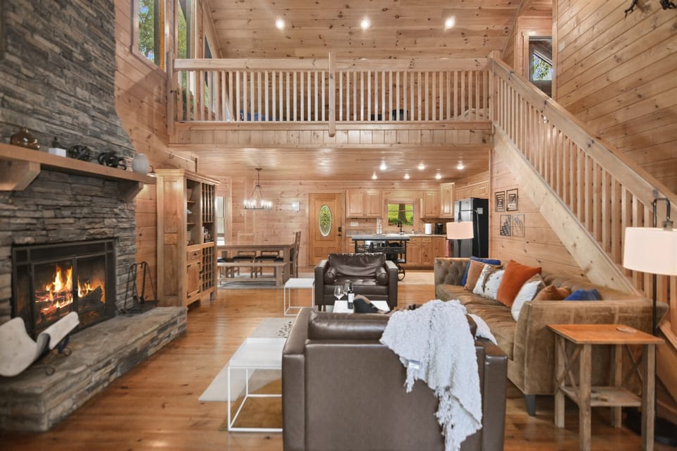 Seamless blend of modern and rustic warmth around the open fireplace