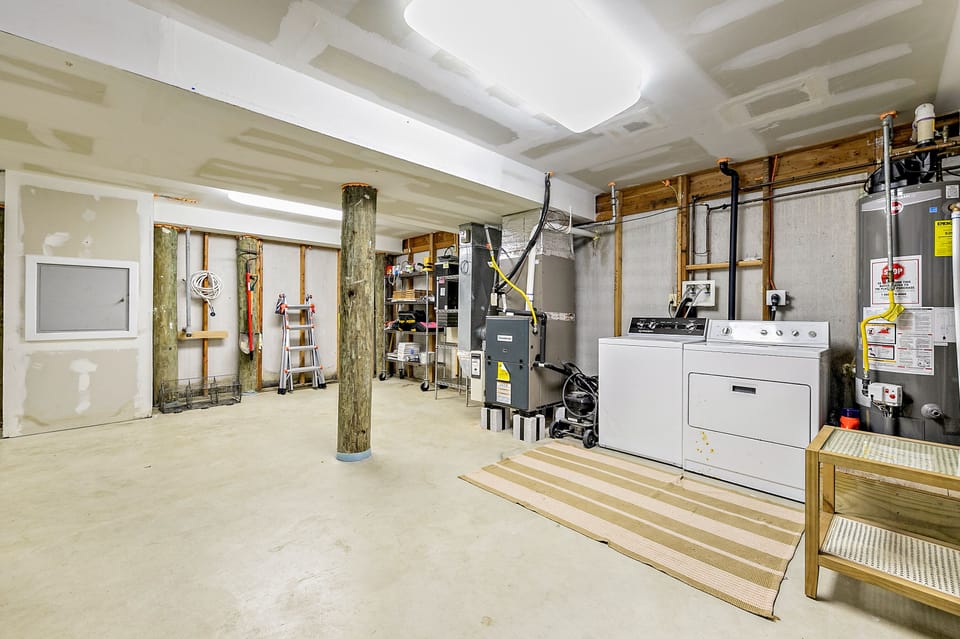 washer dryer and dumb waiter in garage