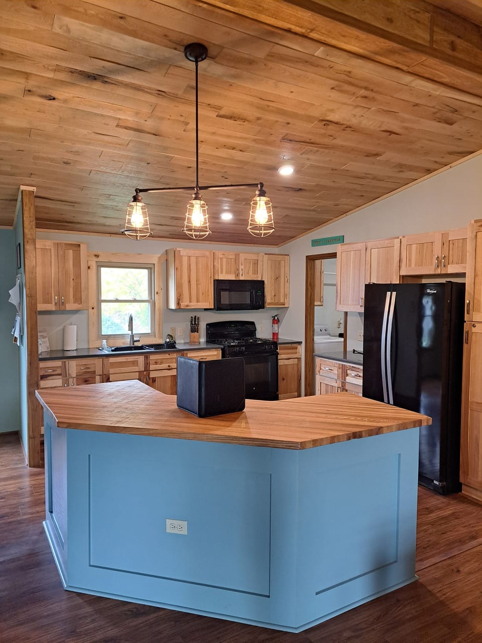 Full kitchen - sink, stove, oven, microwave, refrigerator, & freezer 