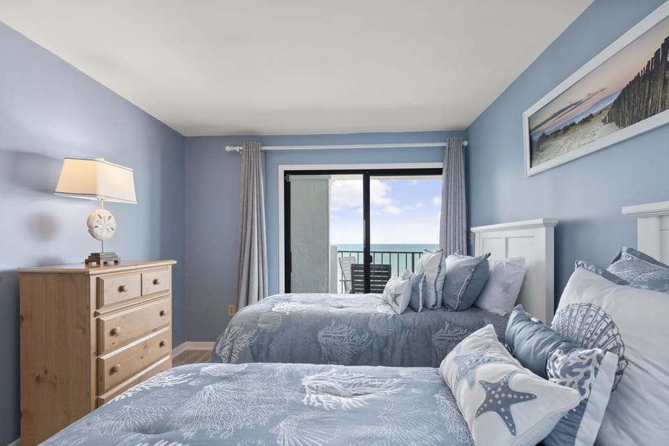 Sliders to the ocean view from both bedrooms