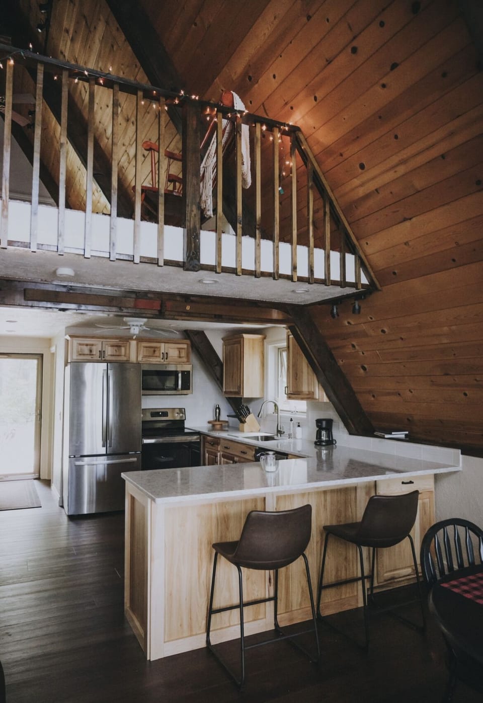 Kitchen and barstool seating area 
