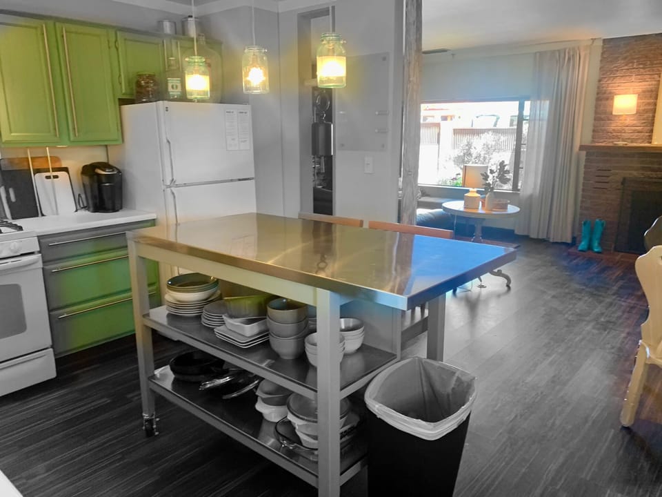 Kitchen breakfast bar & view into living room