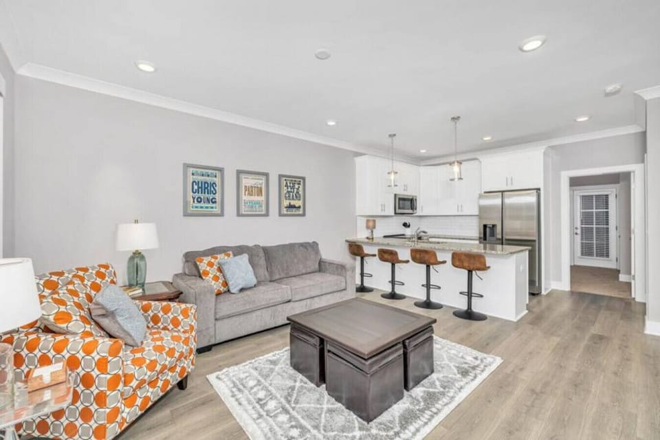 Gathering area, open to the kitchen. Sofa pulls out for additional sleeping options