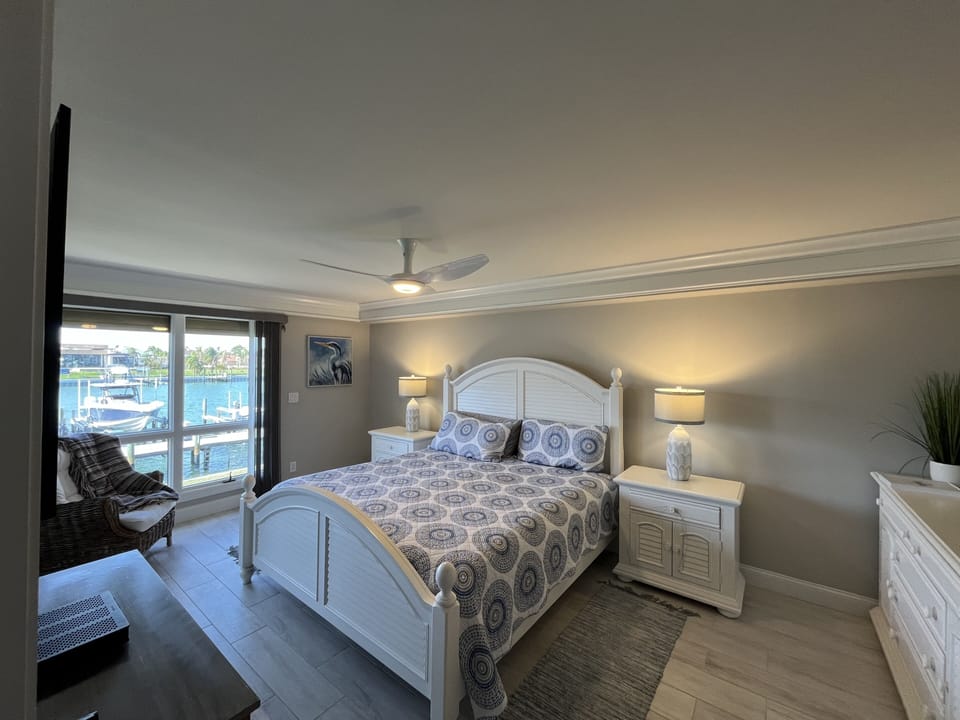 Master bedroom with king bed, huge walk-in closet and private bath