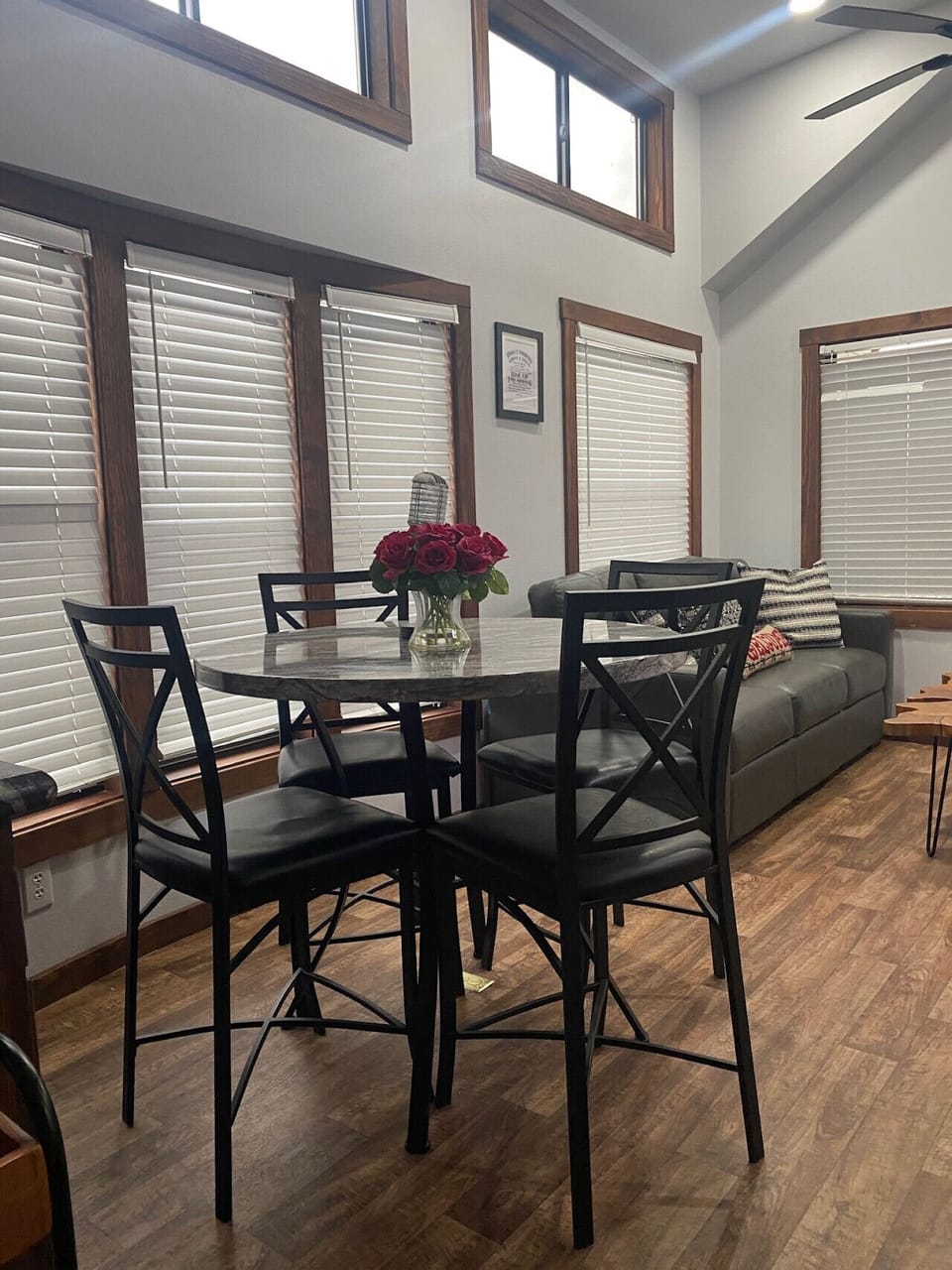 Dining table with living room in background
