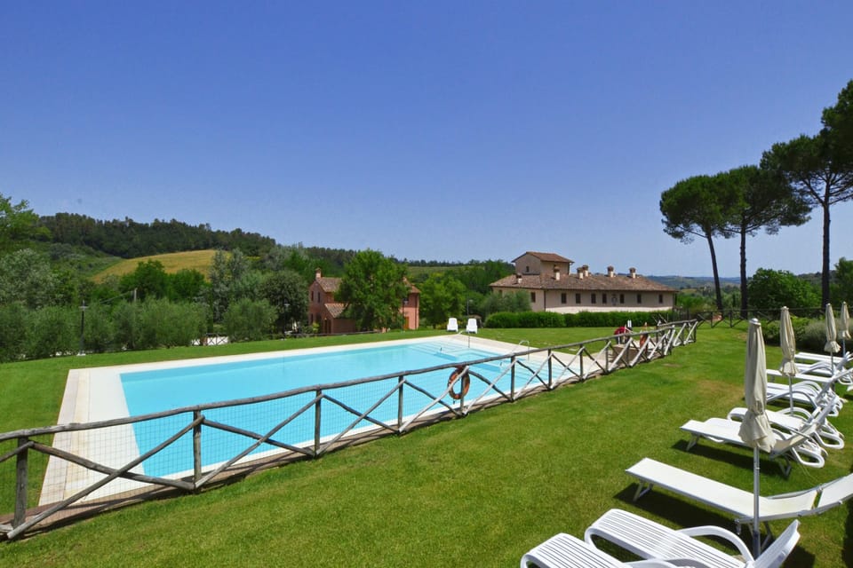 The property surrounding by greenery and the sharing pool
