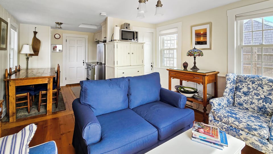 Bright and cozy main living area with living room, dining area and kitchen