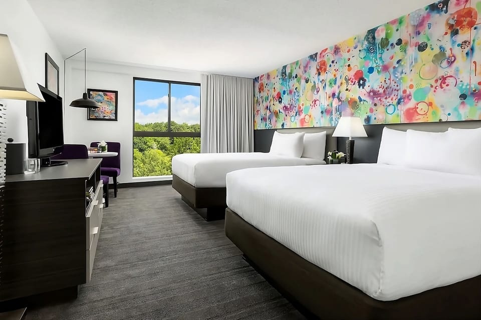 Stretch out in a bright room with art walls and views.