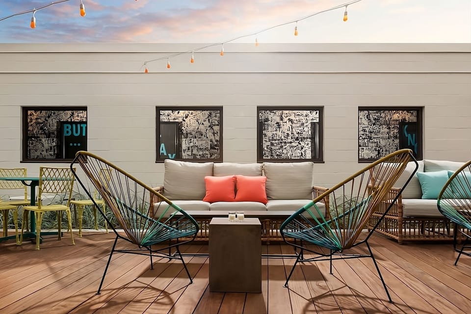 Sip coffee on the sunny deck with cushioned seating.