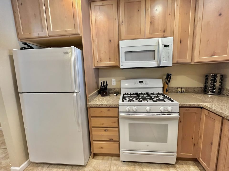 Our kitchen  with 5 burner stove and Oster Air Fryer...
