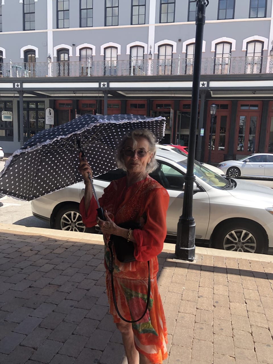 Julie strolling Galveston Strand for shopping,  great food and fun.