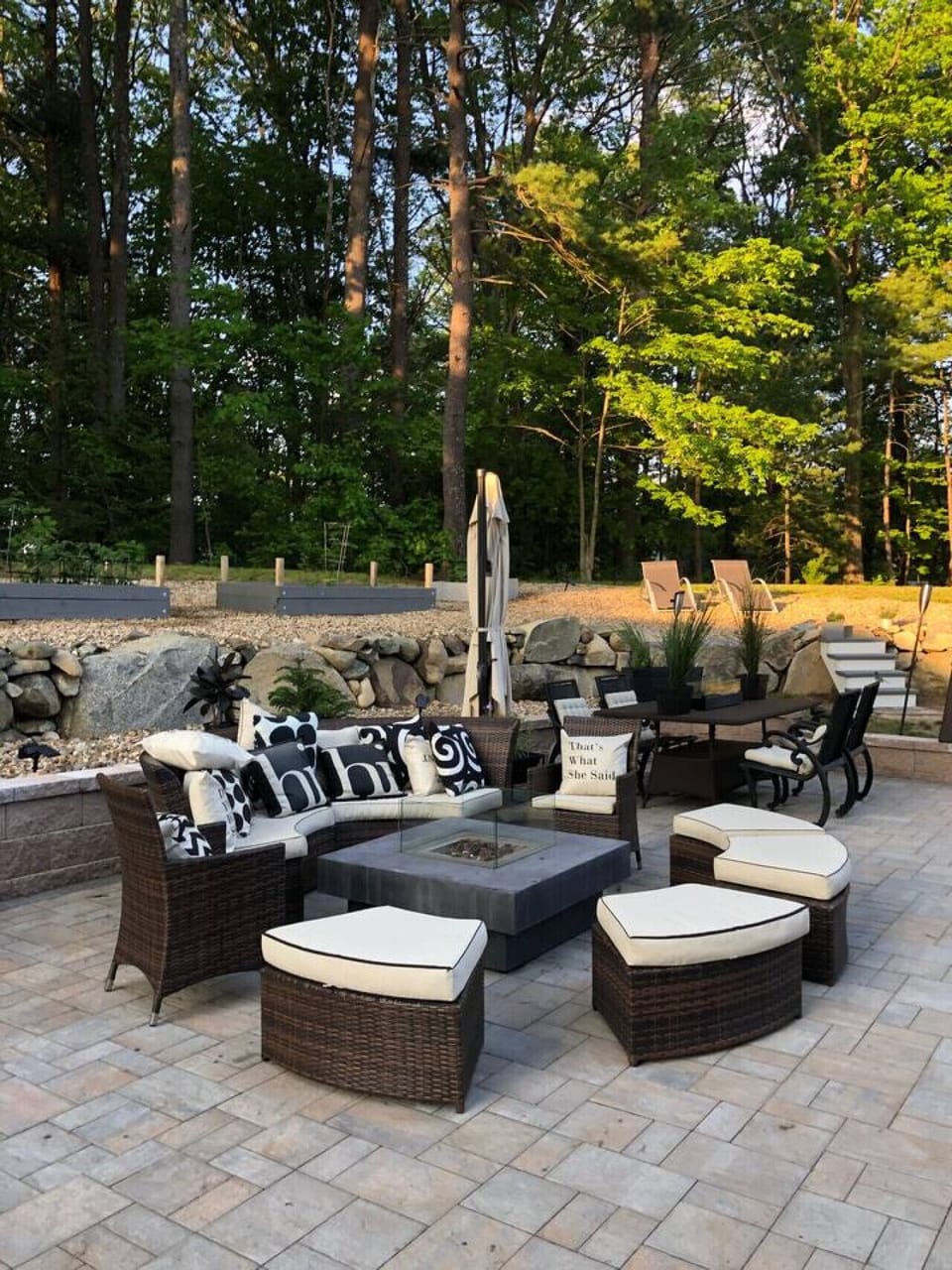 Escape to a stylish Hampton, New Hampshire vacation rental with the feel of a boutique spa hotel, featuring an oversized stone patio, hot tub, fire tables, plush robes, and upscale amenities throughout. Close to Hampton Beach and near Portsmouth and Newbu
