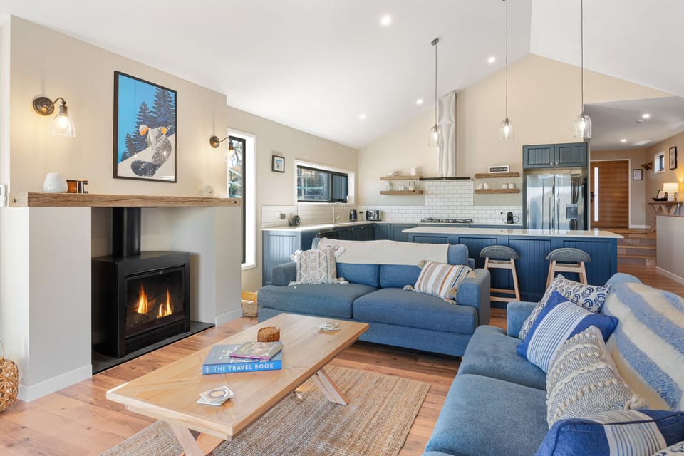 2 comfy sofas perfectly positioned around the cosy wood burner
