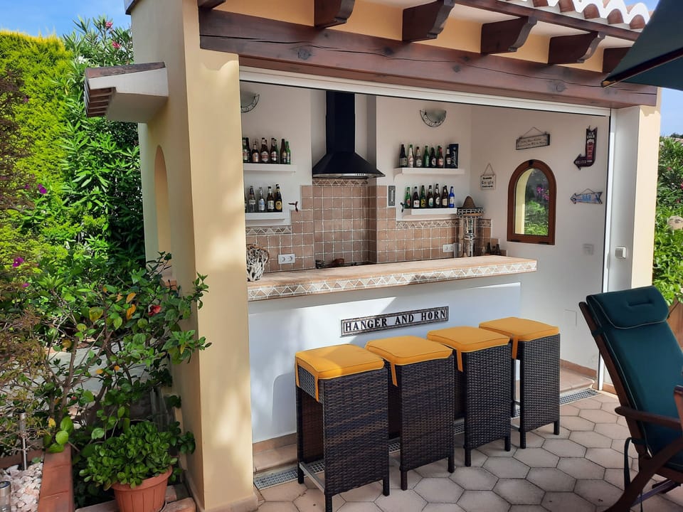 Enjoy a beer or two in our very own 'Hanger & Horn' pool-side bar