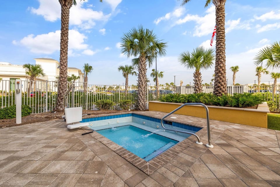 heated Jacuzzi adjacent to pool