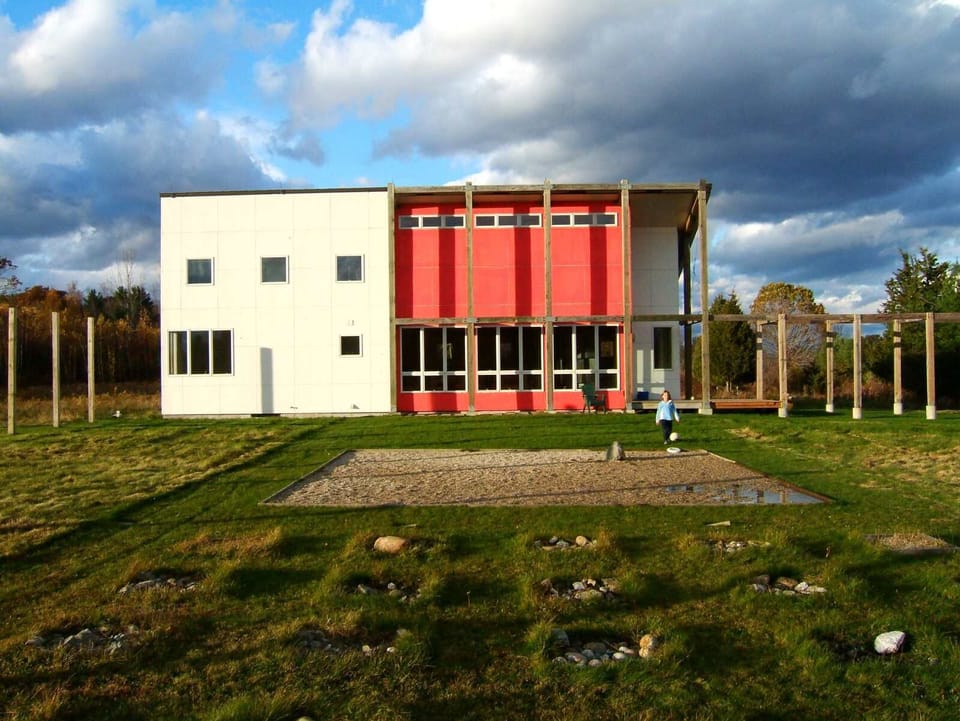 South facade of the house with Zen Square in the foreground
