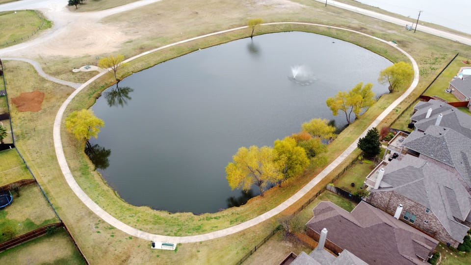 Trail access from backyard, perfect for walking, jogging, or biking