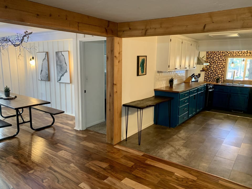 Cedar beams accent the kitchen and dining area.