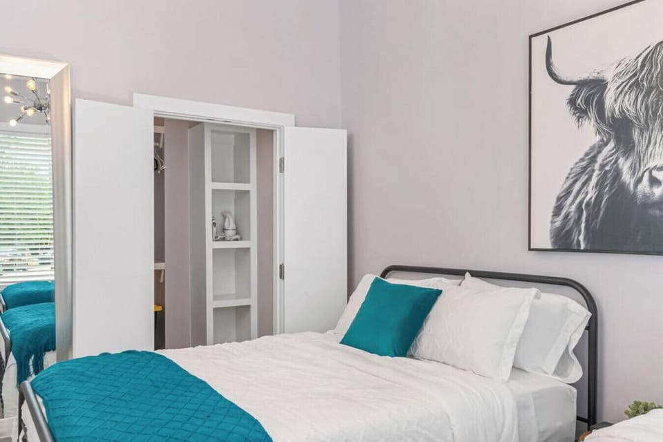 Bedroom has a Queen + Full size beds. Smart TV with all the apps you could want. Closet and dresser to put your clothes in. An air mattress is also available.