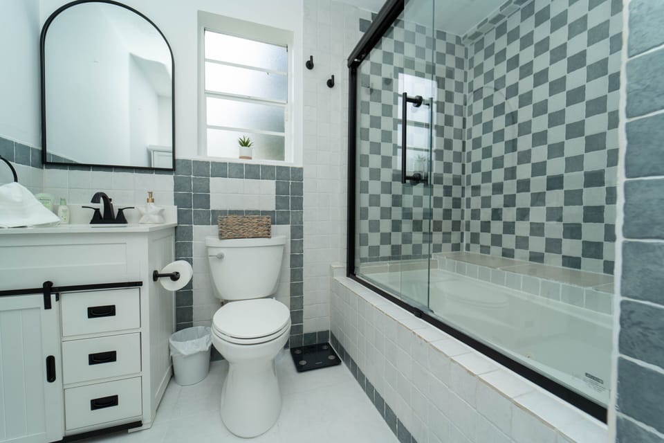 Master bath with shower and jetted tub