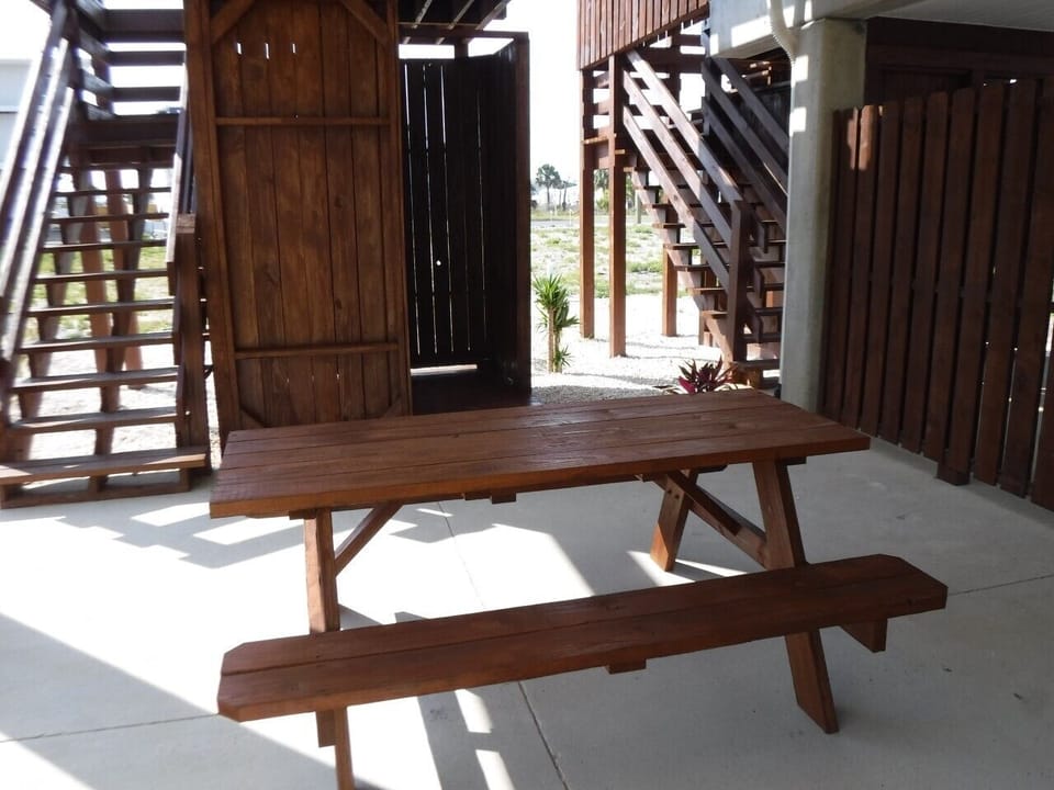 Outside picnic table and enclosed shower/toilet
