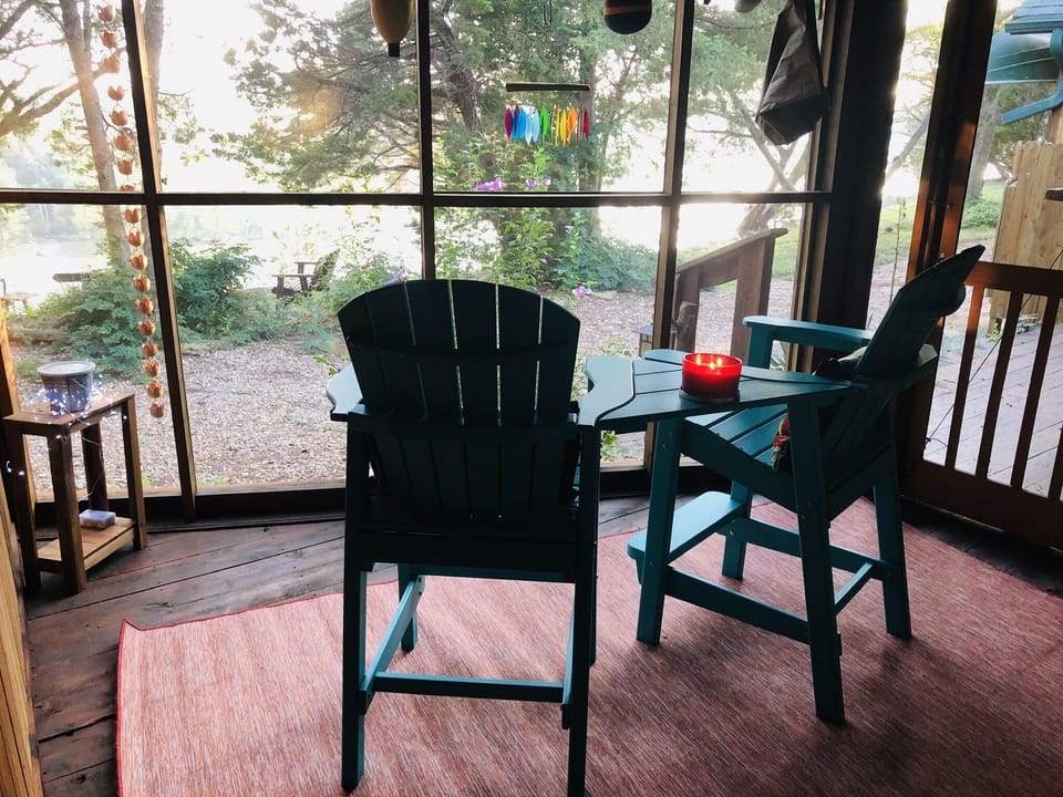 Back screened in porch with bluff/lake views