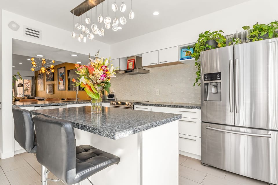Renovated kitchen with stainless steel alliances. 