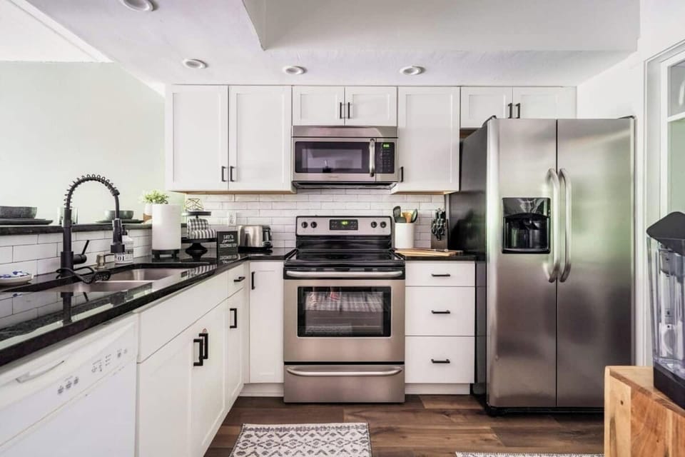 Spice things up in the full kitchen, accessorized with essential cooking items