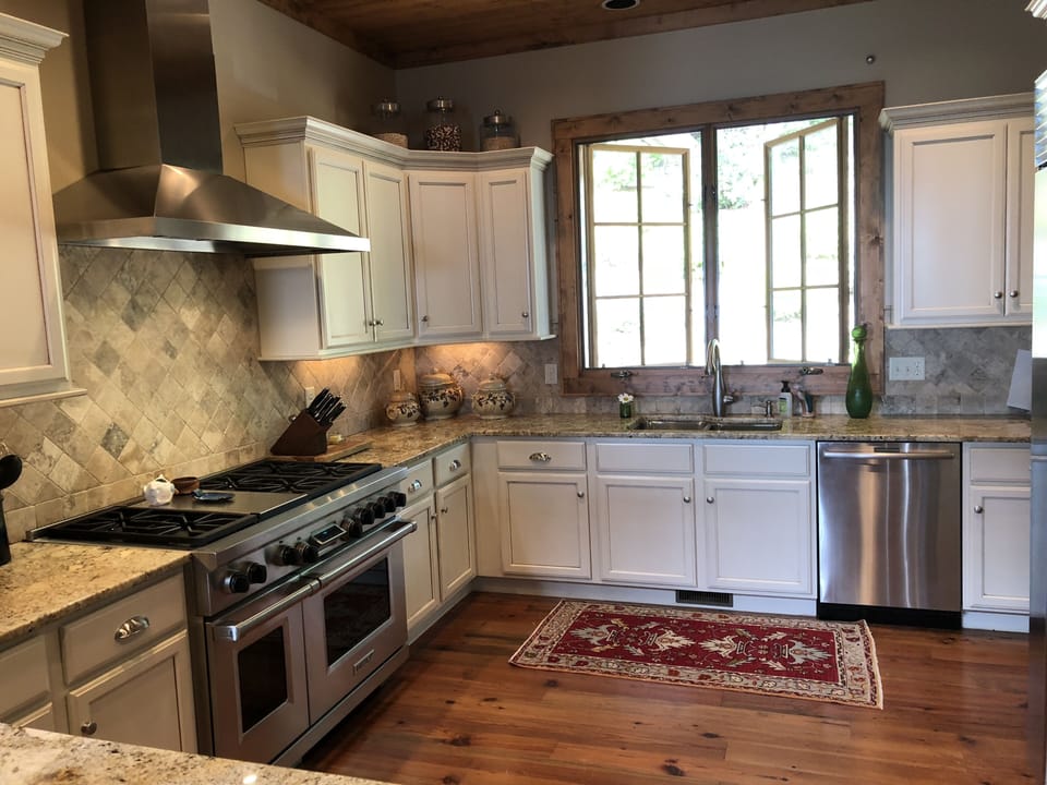 Chefs kitchen with wolf range, subzero fridge and stand alone ice maker 