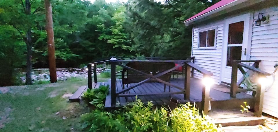 The deck and entry door at dusk.