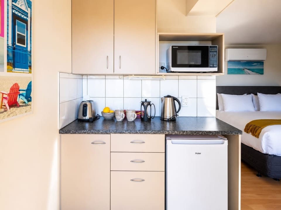 Kitchen has mini bar, microwave, kettle and toaster. Plugger coffee and tea is provided