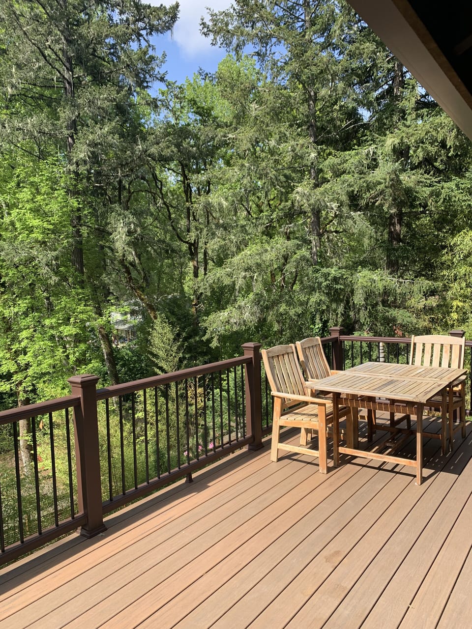 Lovely new deck with dining room table and chairs for al fresco dinners.