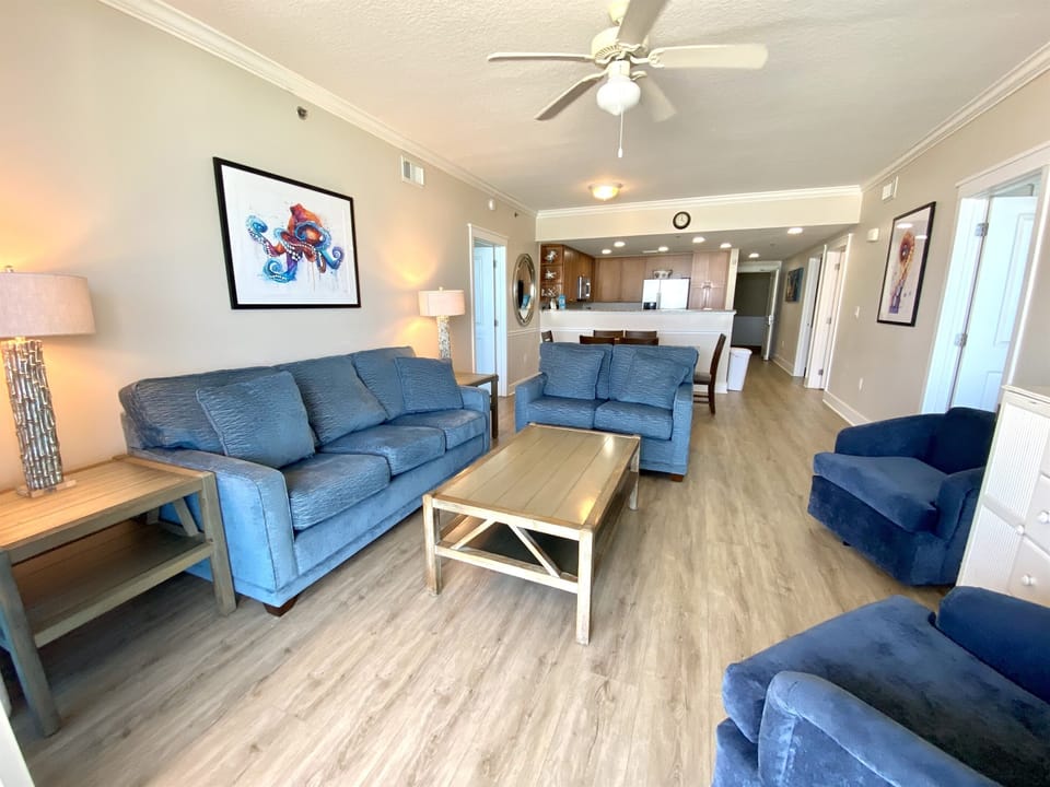 Living Room w/couch and loveseat along with 2 swivel chairs 