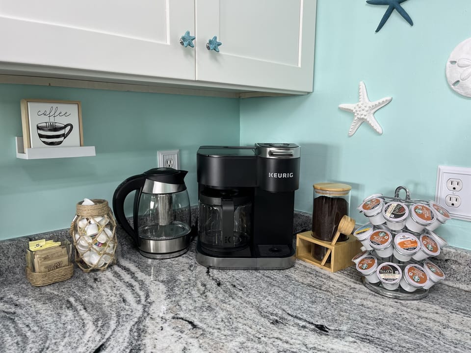 Coffee Bar - Keurig duo coffee maker with pot and single serve options.