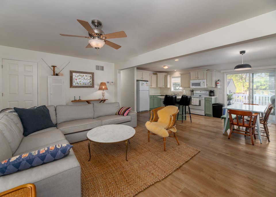 Open concept space with living, dining and kitchen that leads to a huge deck. 