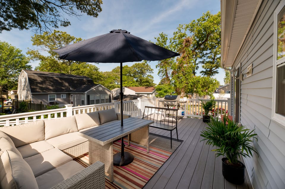 Large deck for enjoying a cocktail or nap.