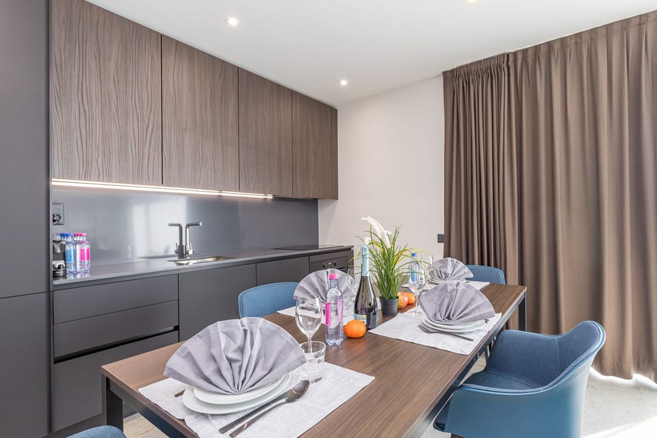 Dining table with kitchen in the living room