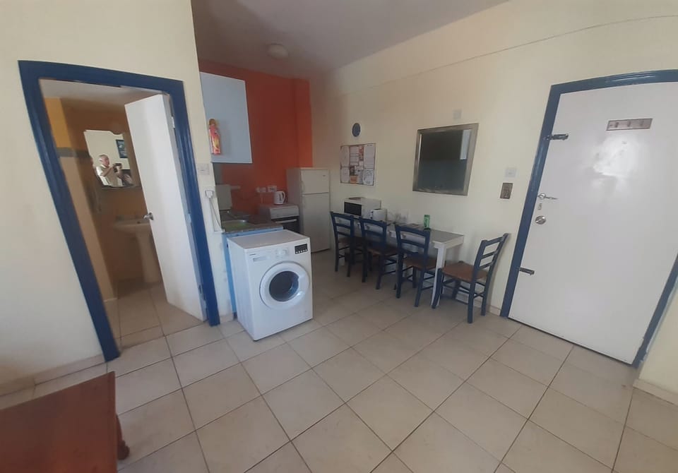 kitchen area with, mini oven, microwave,toaster.