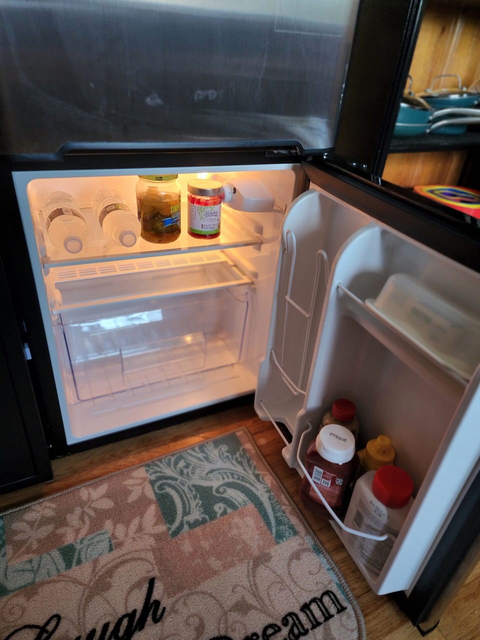 Refrigerator freezer in kitchen.
